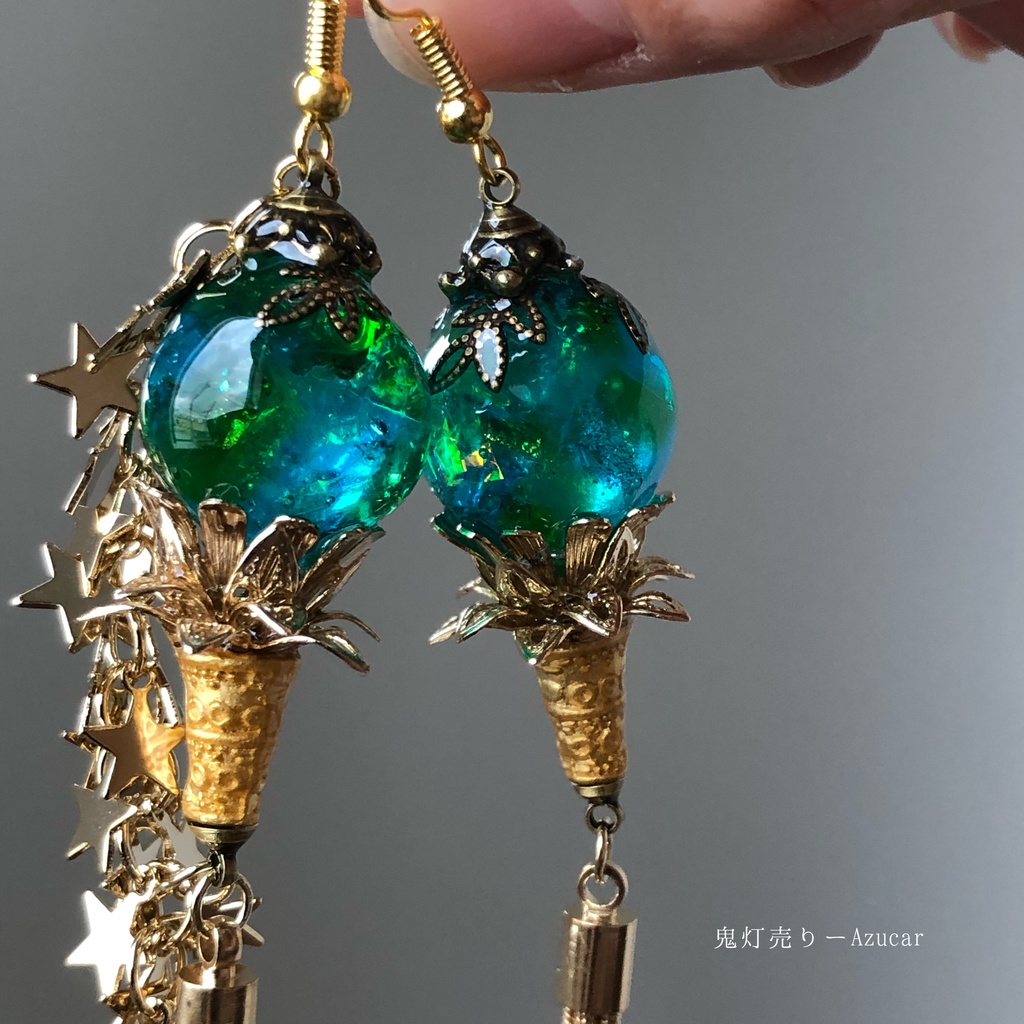天体魔法使いの蓄光星屑ランタン アシンメトリーピアス イヤリング タッセル付き