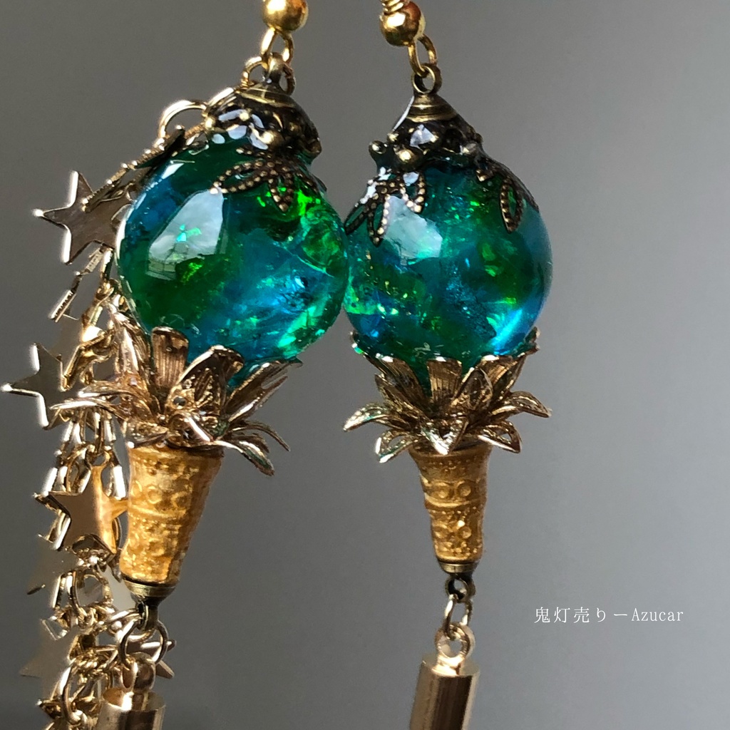 天体魔法使いの蓄光星屑ランタン アシンメトリーピアス イヤリング タッセル付き