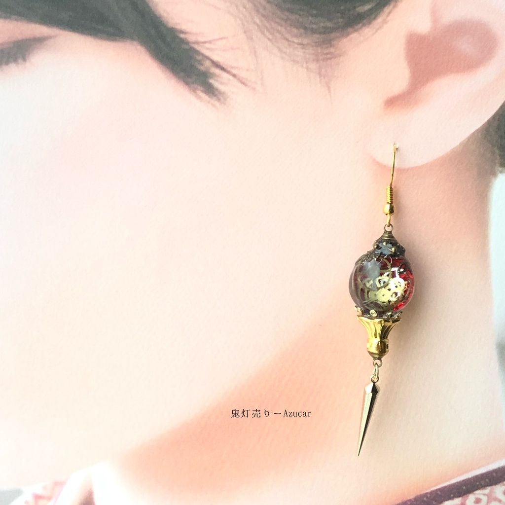 宇宙の宝石と時計の国の夕焼けランタン スチームパンク 歯車 オルゴナイトのピアス イヤリング