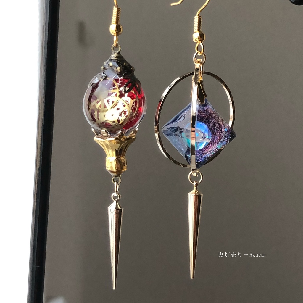 宇宙の宝石と時計の国の夕焼けランタン スチームパンク 歯車 オルゴナイトのピアス イヤリング