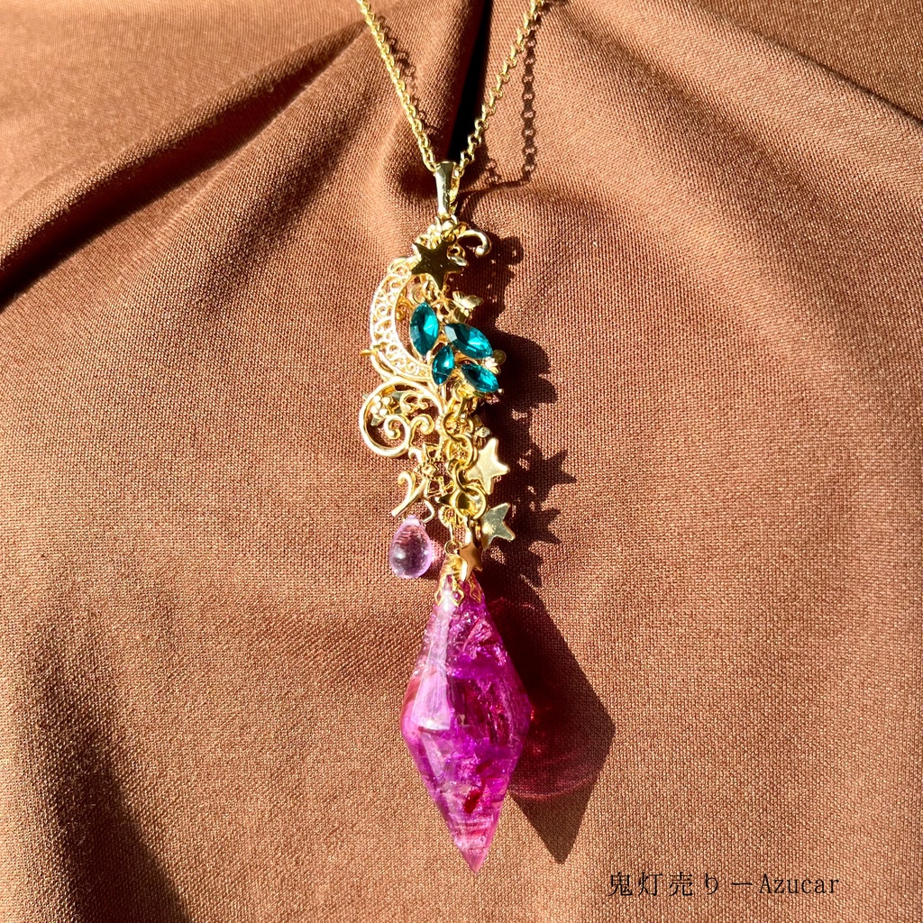 星屑を纏う葡萄のようなルビーペンデュラムネックレス