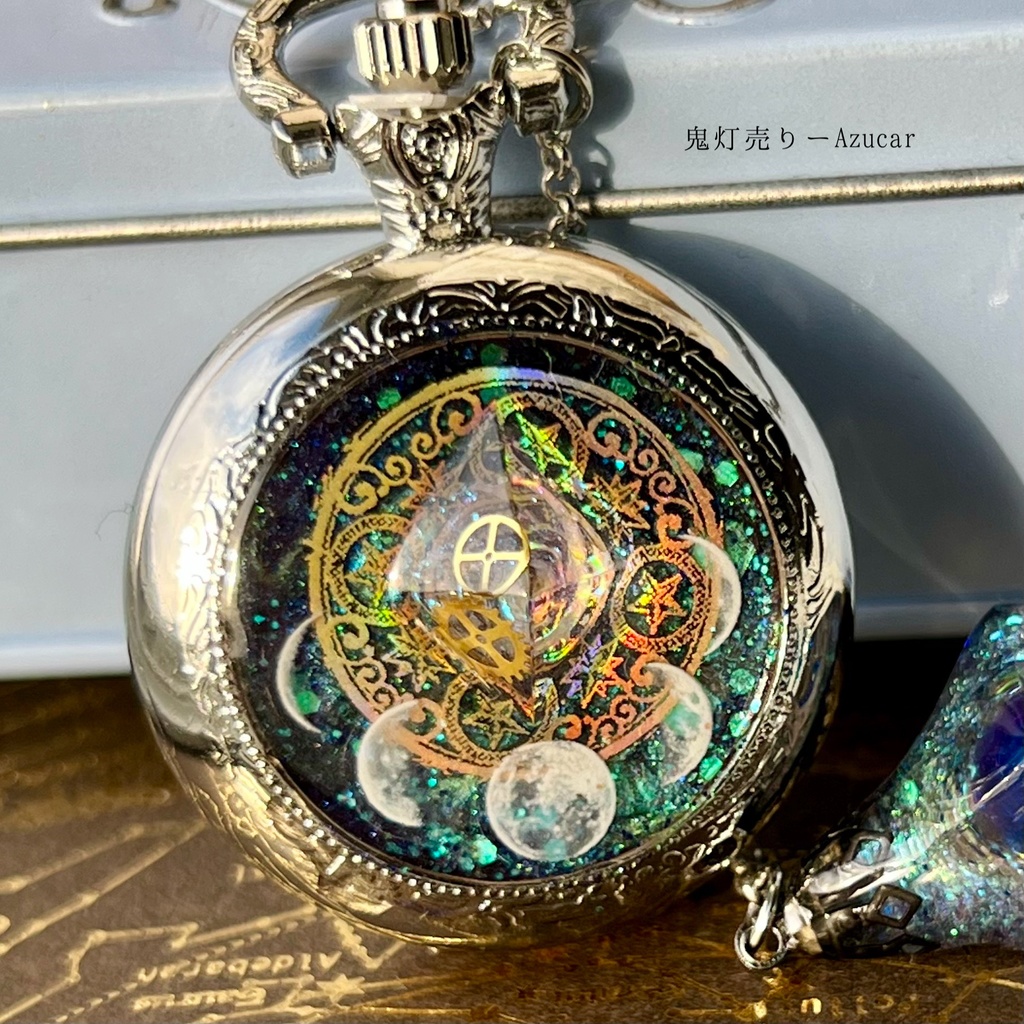 宇宙魔法陣と歯車の蓄光懐中時計|偏光オクタゴン封入・夜空のように一つずつ異なる輝き