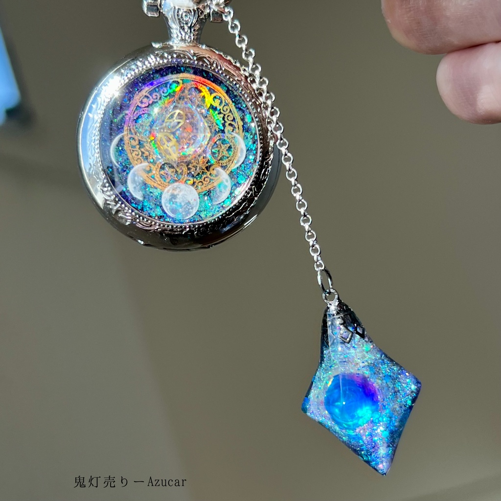 宇宙魔法陣と歯車の蓄光懐中時計|偏光オクタゴン封入・夜空のように一つずつ異なる輝き