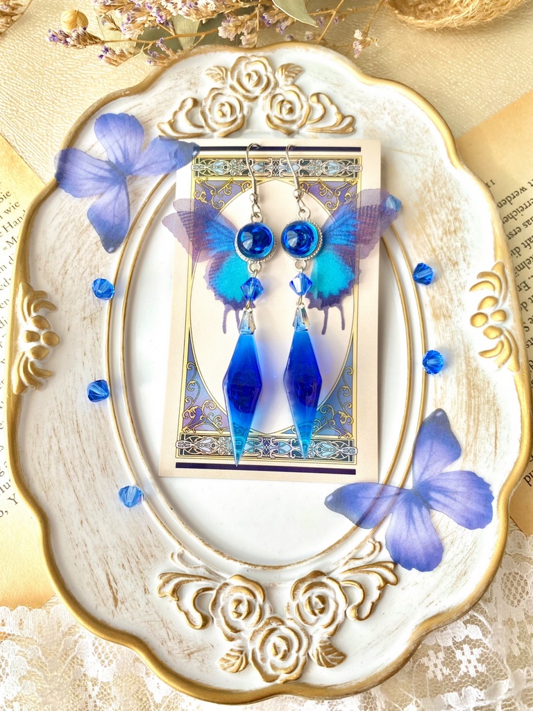 スカイブルーサファイアのローズバタフライ　ペンデュラムピアス