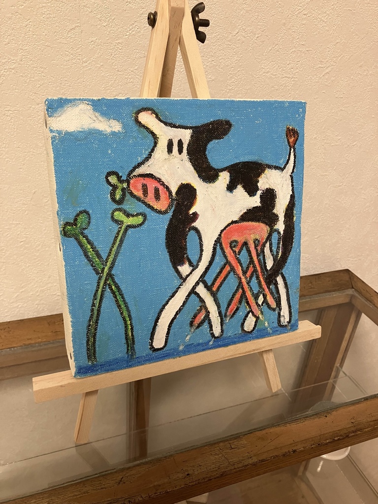 キャンバス原画「草を食む長い牛」