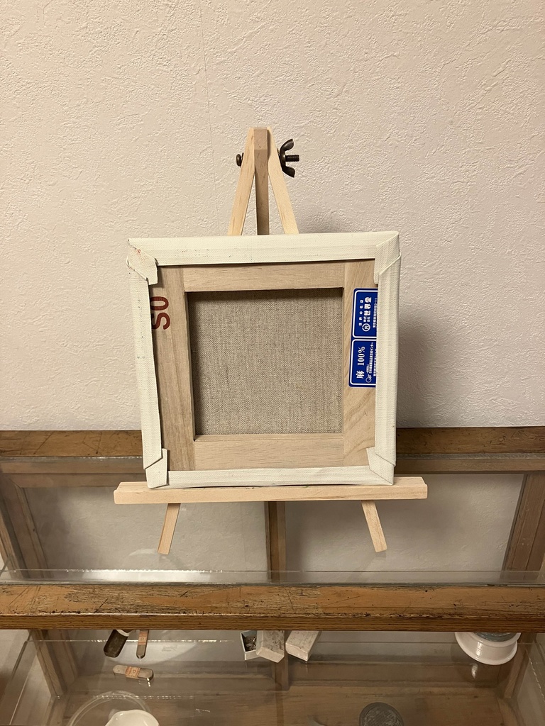 キャンバス原画「草を食む長い牛」