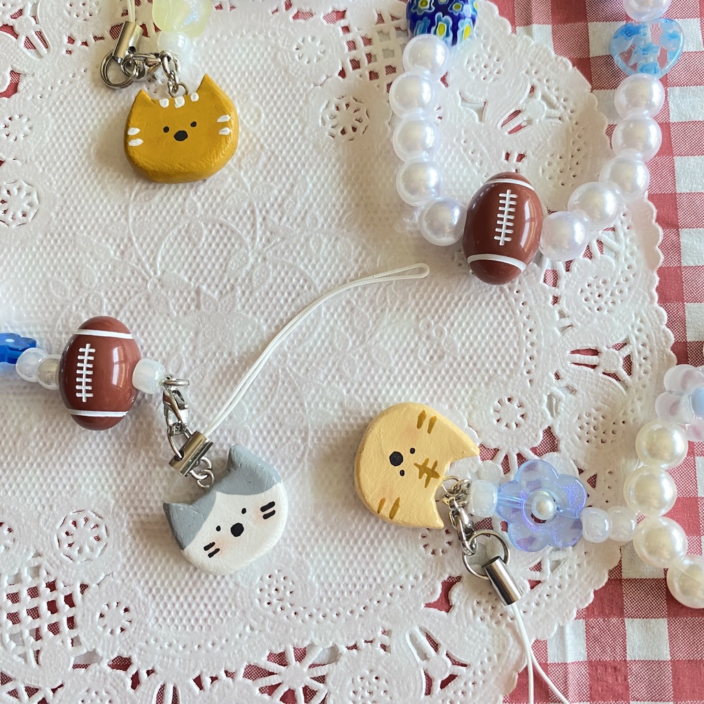 ねことラグビーのストラップ🏉