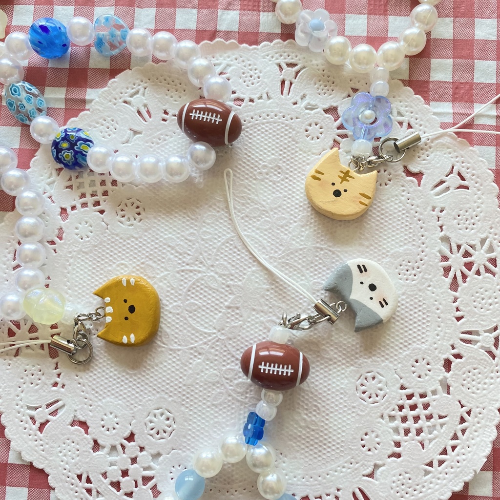 ねことラグビーのストラップ🏉