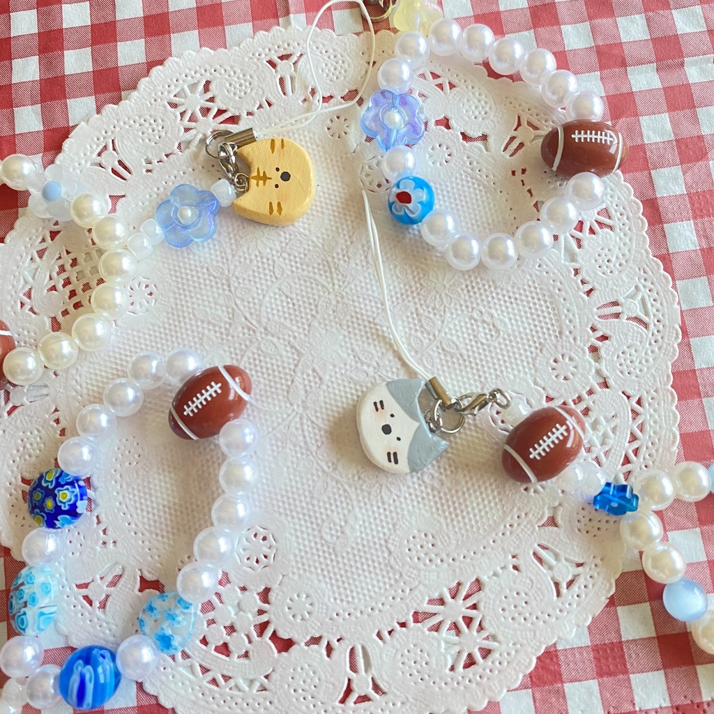 ねことラグビーのストラップ🏉