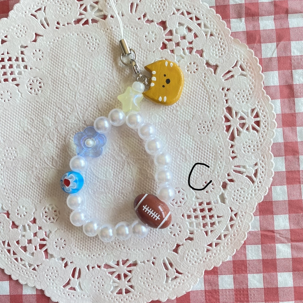 ねことラグビーのストラップ🏉