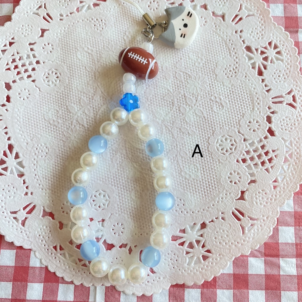 ねことラグビーのストラップ🏉