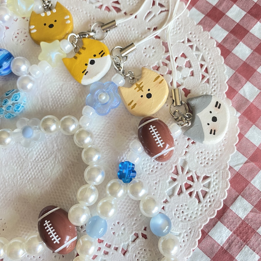 ねことラグビーのストラップ🏉