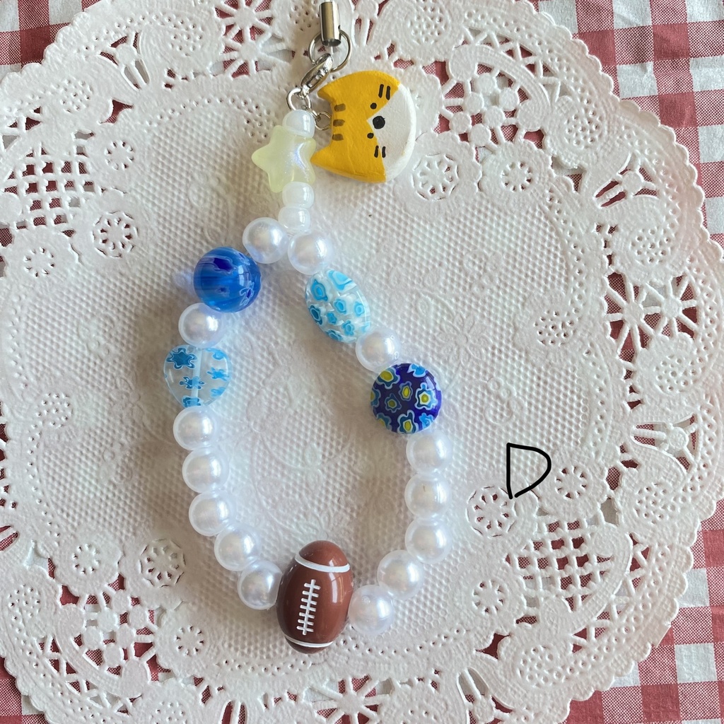 ねことラグビーのストラップ🏉