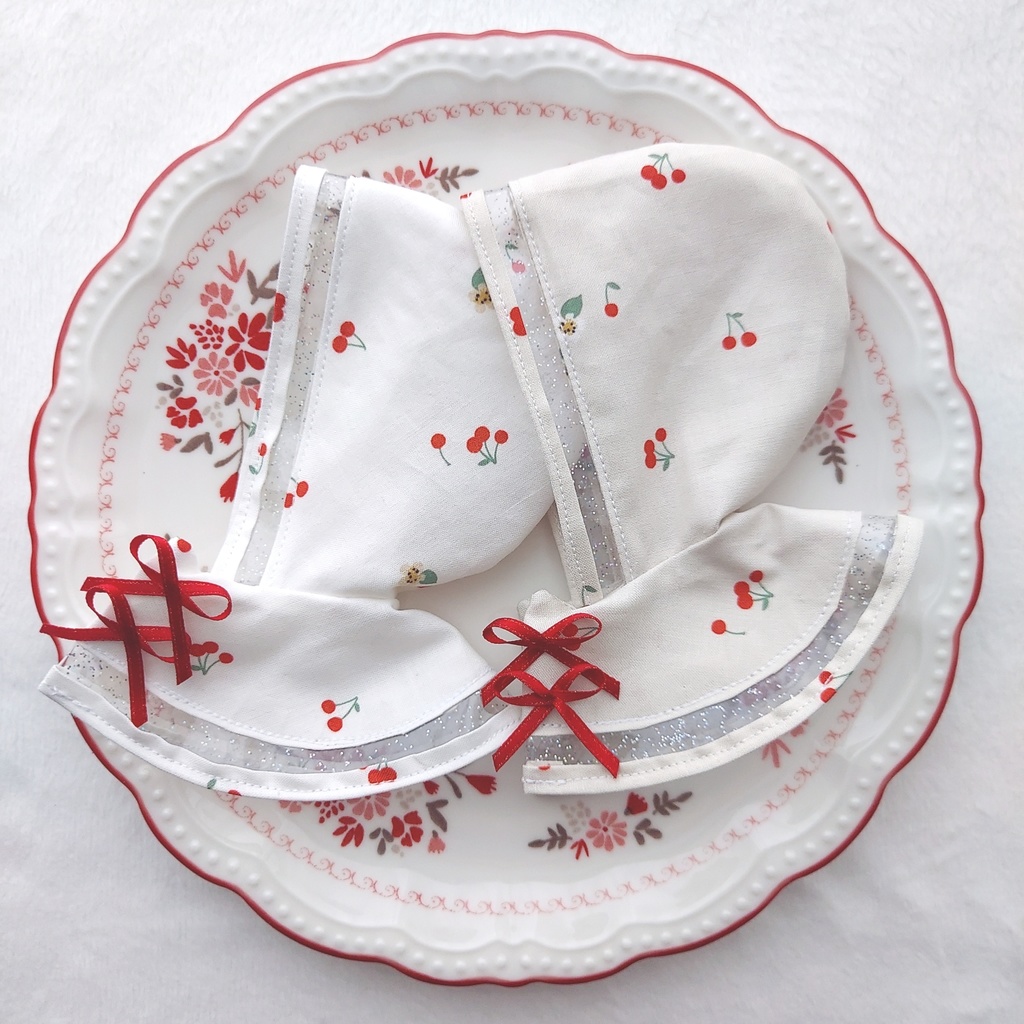 さくらんぼのポンチョ