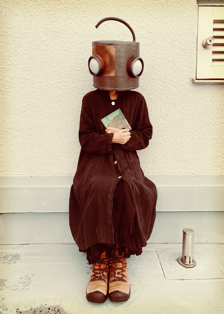 傘の下で降る雨