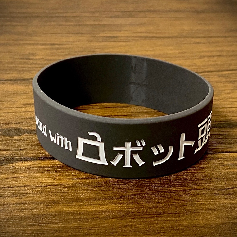 ロボット頭「一緒に行こうラバーバンド」