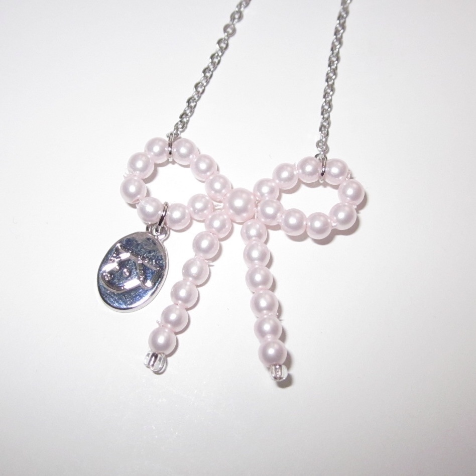 baby pink ribbon necklace