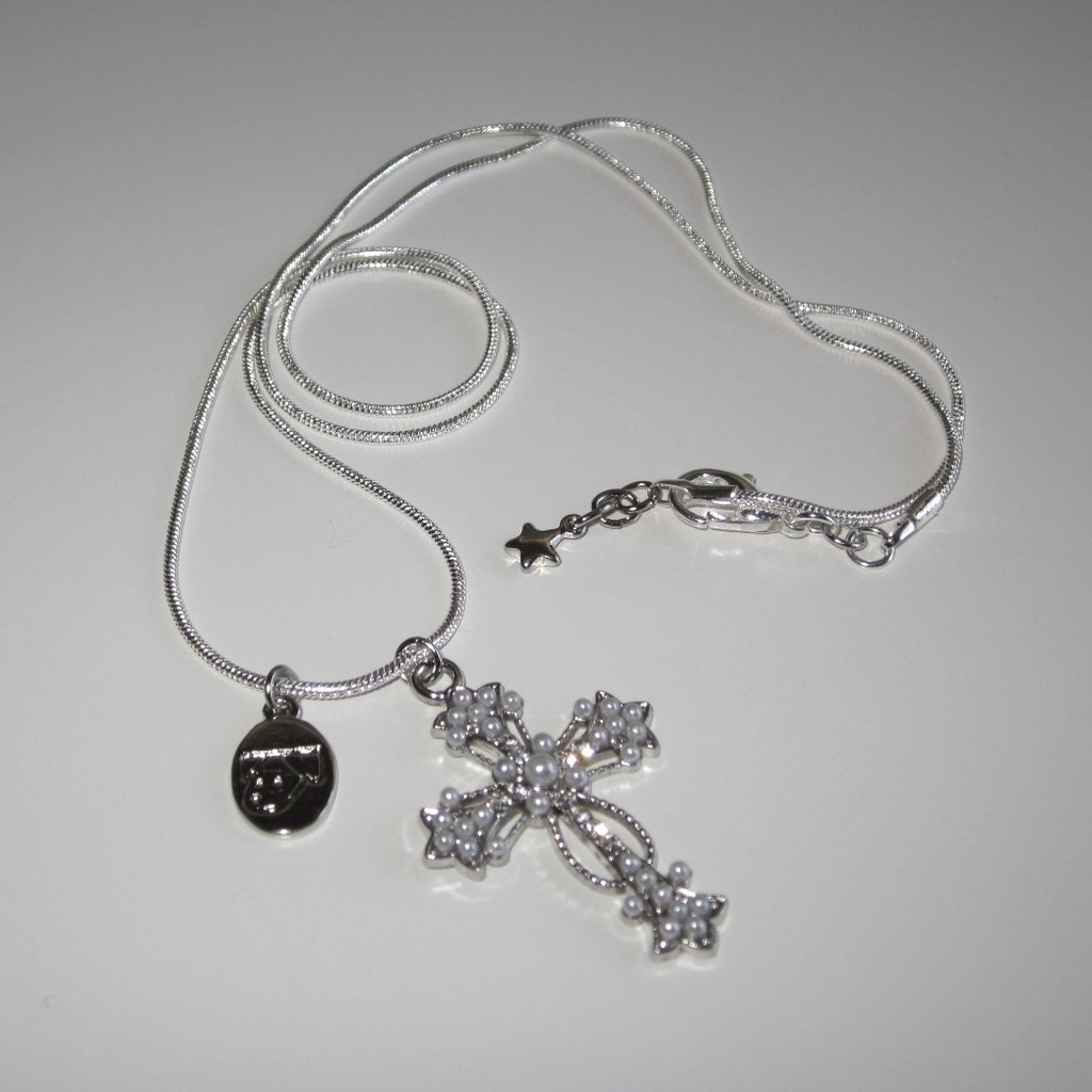 twinkle cross necklace