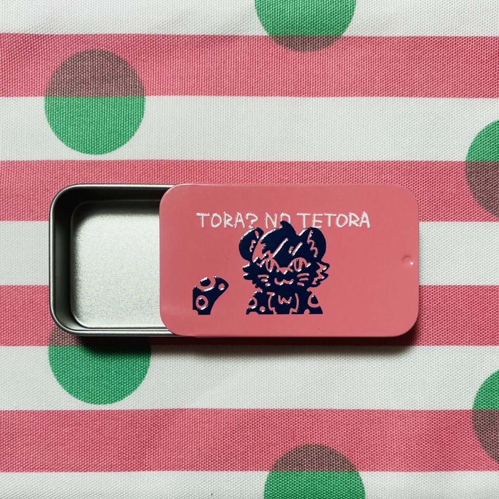 トラ(?)のてとら 缶かん