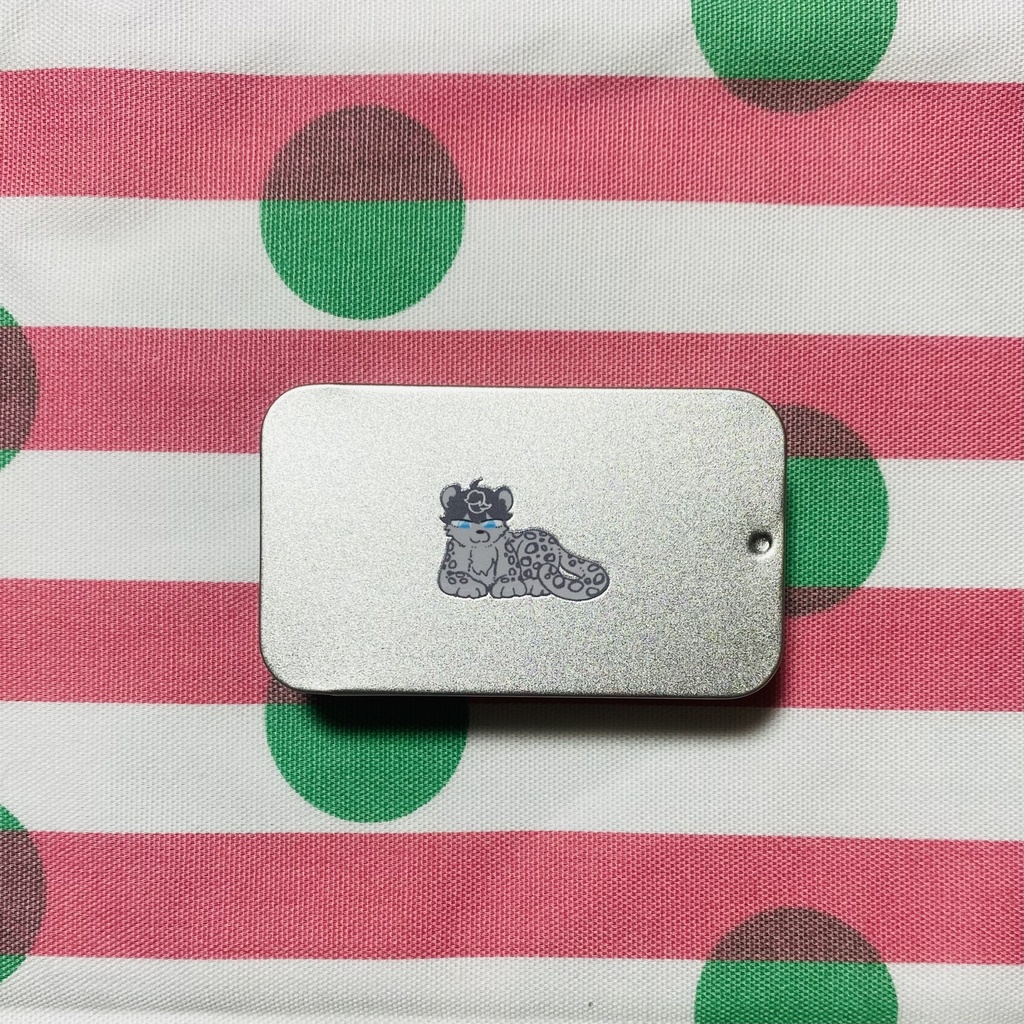 ユキヒョウのせな　缶かん