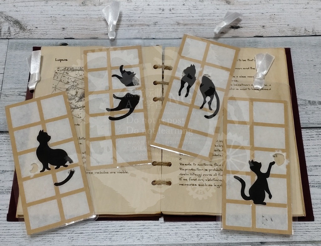 切り絵しおり　【障子を破る猫】
