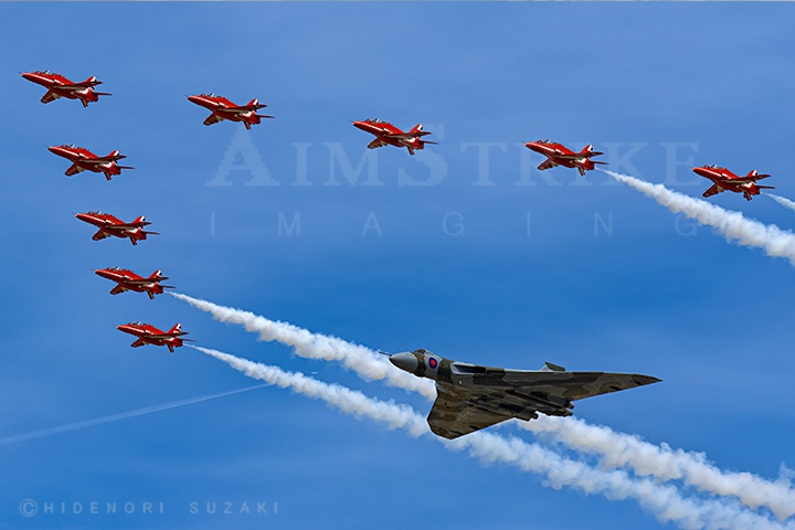 Red Arrows leading Avro Vulcan