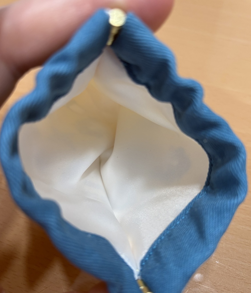 利こまバネポーチ