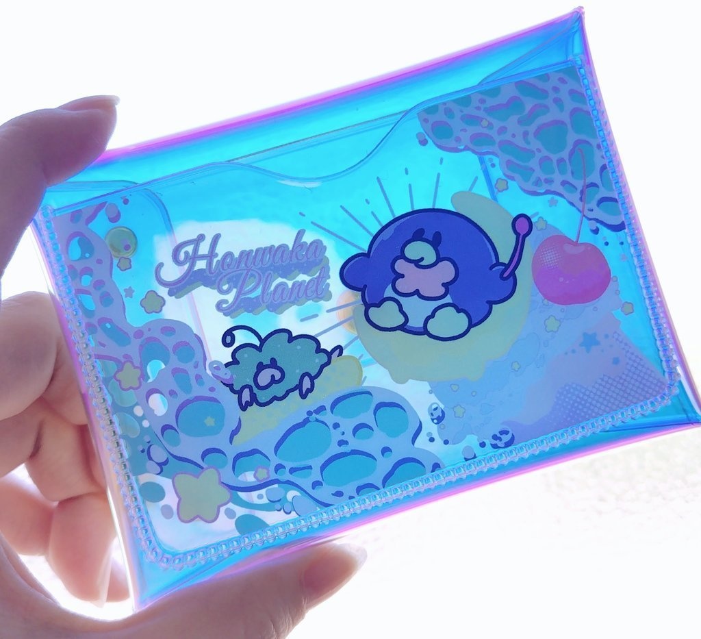 ほんわかポップなオーロラミニポーチ🐳