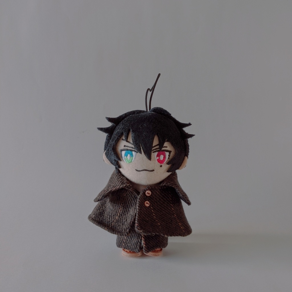 茶色のインバネスコート