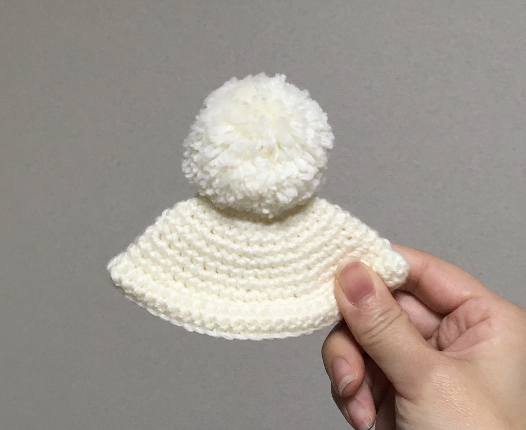 ぽんぽん付き帽子
