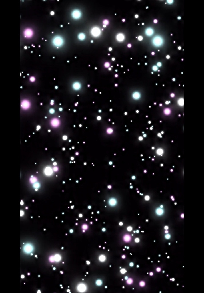 カラフルな光の粒子が揺らぎながら舞う背景
