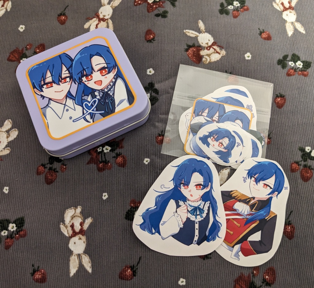 クリフォード兄妹のシール入り缶ケース