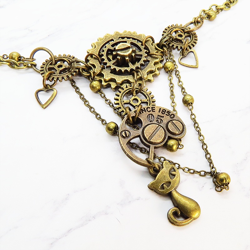 アンティークゴールドの猫と歯車・ギアの多層構造ネックレス スチームパンク ゴシック 金古美色