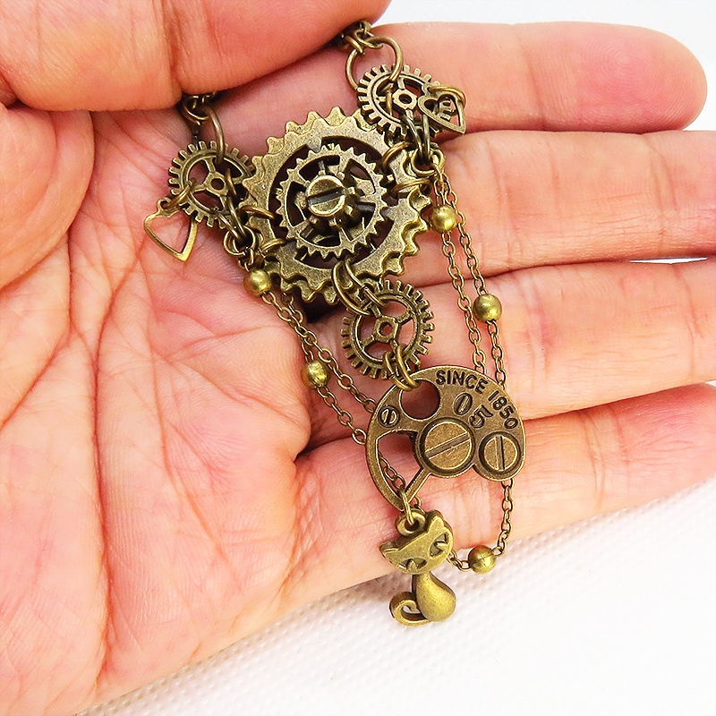アンティークゴールドの猫と歯車・ギアの多層構造ネックレス スチームパンク ゴシック 金古美色