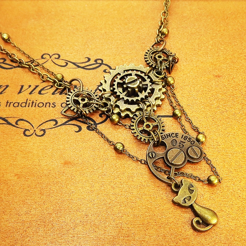 アンティークゴールドの猫と歯車・ギアの多層構造ネックレス スチームパンク ゴシック 金古美色