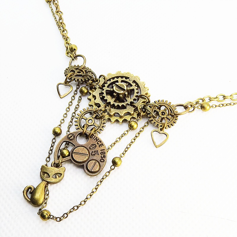 アンティークゴールドの猫と歯車・ギアの多層構造ネックレス スチームパンク ゴシック 金古美色