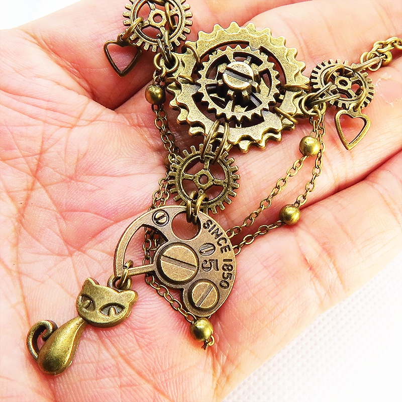 アンティークゴールドの猫と歯車・ギアの多層構造ネックレス スチームパンク ゴシック 金古美色
