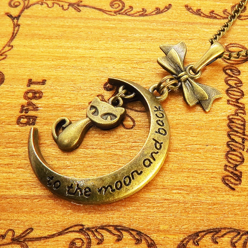 アンティークゴールド 三日月と猫の大人可愛いネックレス ゴシック リボン ムーンネックレス アジャスター付 長さ調整可