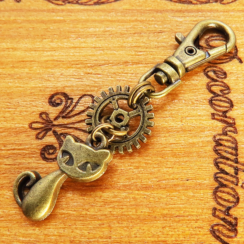 アンティークゴールド 猫と歯車のシンプルで可愛いファスナーチャーム キーホルダー バッグチャーム 金具変更可