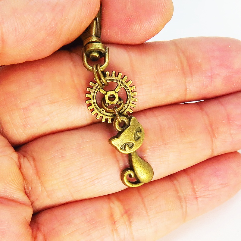 アンティークゴールド 猫と歯車のシンプルで可愛いファスナーチャーム キーホルダー バッグチャーム 金具変更可