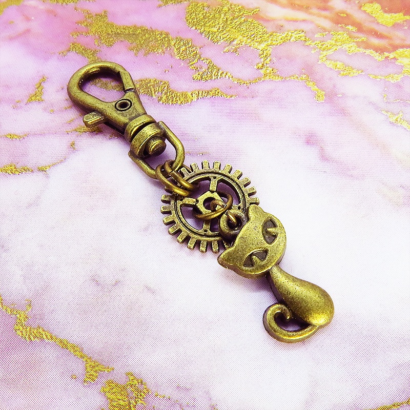 アンティークゴールド 猫と歯車のシンプルで可愛いファスナーチャーム キーホルダー バッグチャーム 金具変更可