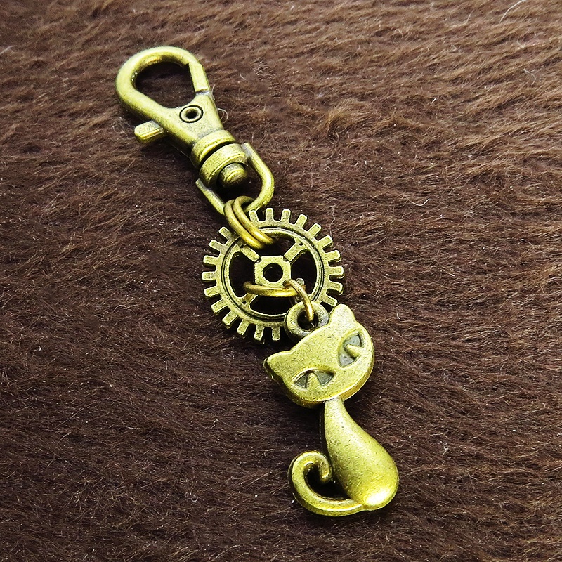 アンティークゴールド 猫と歯車のシンプルで可愛いファスナーチャーム キーホルダー バッグチャーム 金具変更可