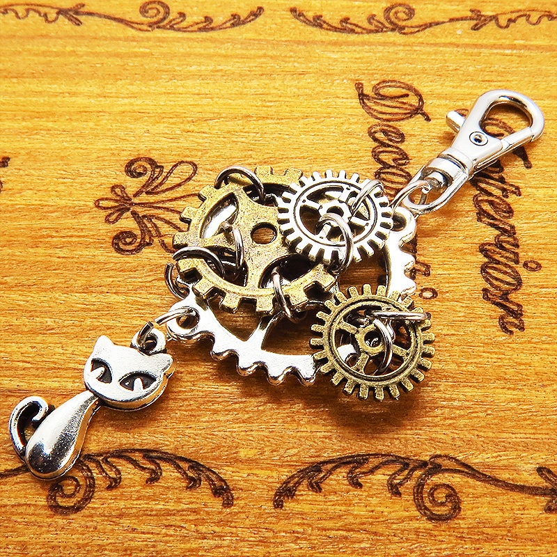 スチームパンク風 猫と複数の歯車を組み合わせたキーホルダー ファスナーチャーム バッグチャーム