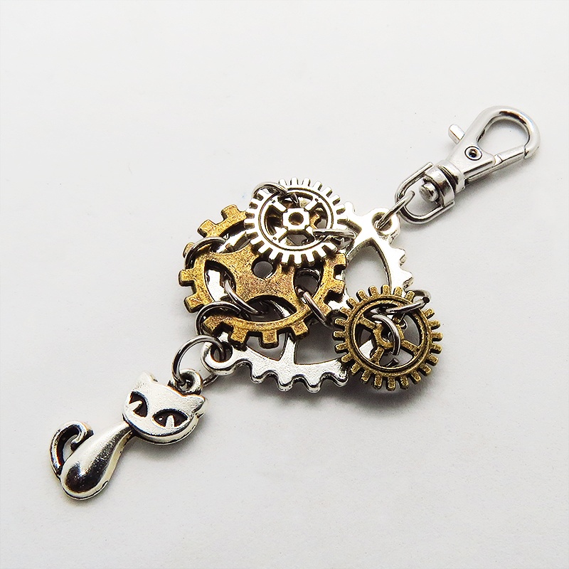 スチームパンク風 猫と複数の歯車を組み合わせたキーホルダー ファスナーチャーム バッグチャーム