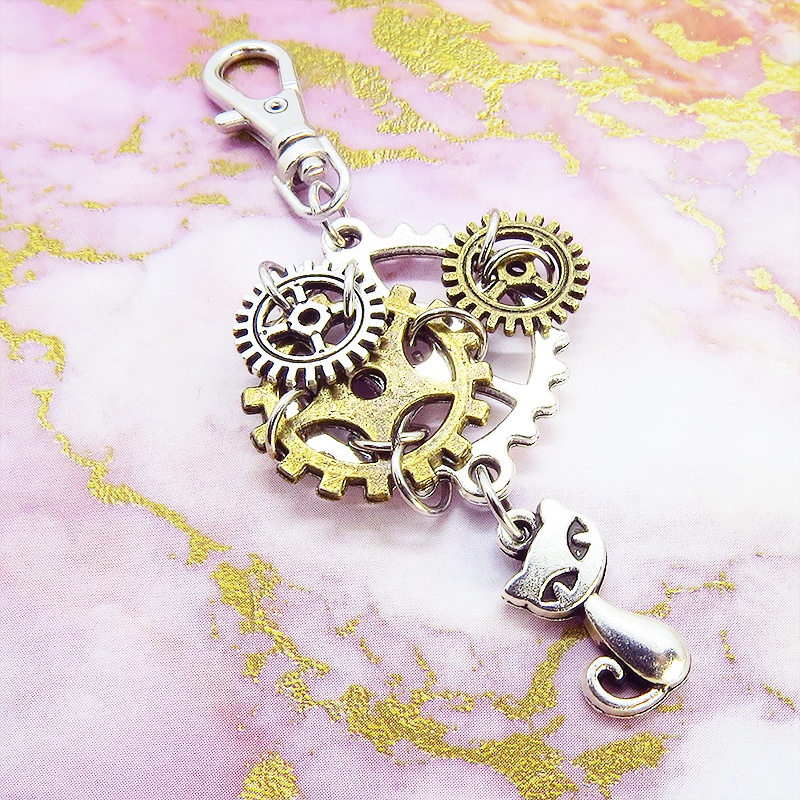 スチームパンク風 猫と複数の歯車を組み合わせたキーホルダー ファスナーチャーム バッグチャーム