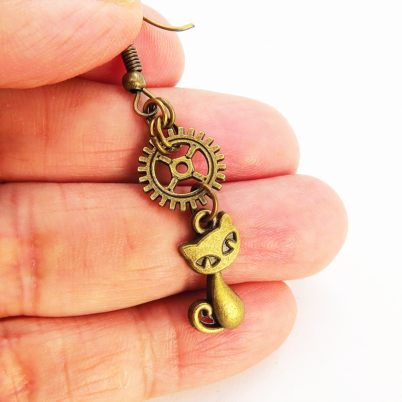 アンティークゴールド 猫とギア・歯車の可愛くカッコいいピアス 猫好き パンク ゴシック スチームパンク風