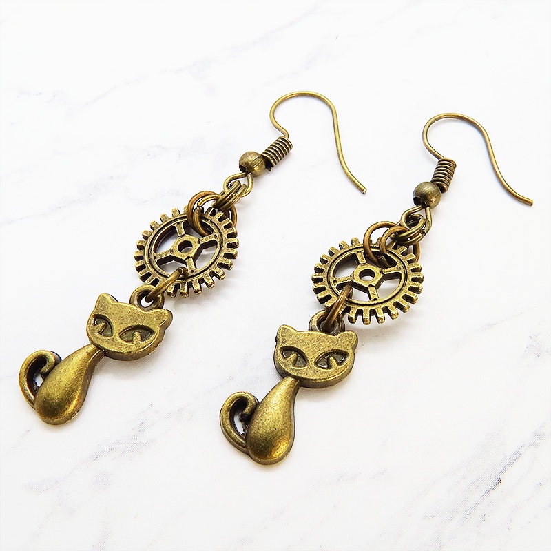 アンティークゴールド 猫とギア・歯車の可愛くカッコいいピアス 猫好き パンク ゴシック スチームパンク風