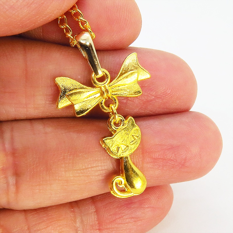 ゴールドカラーの猫とリボンのシンプルで可愛いネックレス 長さ変更可 SV925 18KGC変更可 アジャスター可