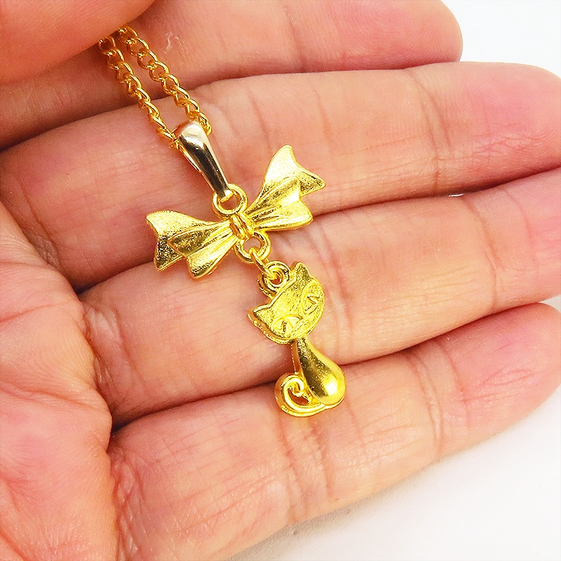 ゴールドカラーの猫とリボンのシンプルで可愛いネックレス 長さ変更可 SV925 18KGC変更可 アジャスター可