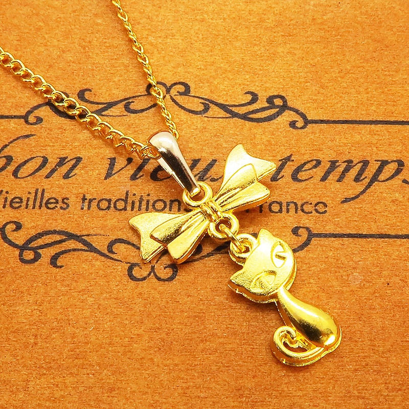 ゴールドカラーの猫とリボンのシンプルで可愛いネックレス 長さ変更可 SV925 18KGC変更可 アジャスター可